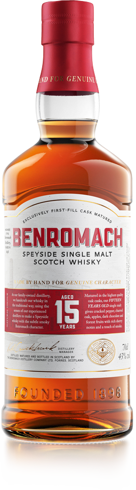 A bottle of Benromach 15 Year Old Speyside Single Malt Whisky with branding and age prominent on label