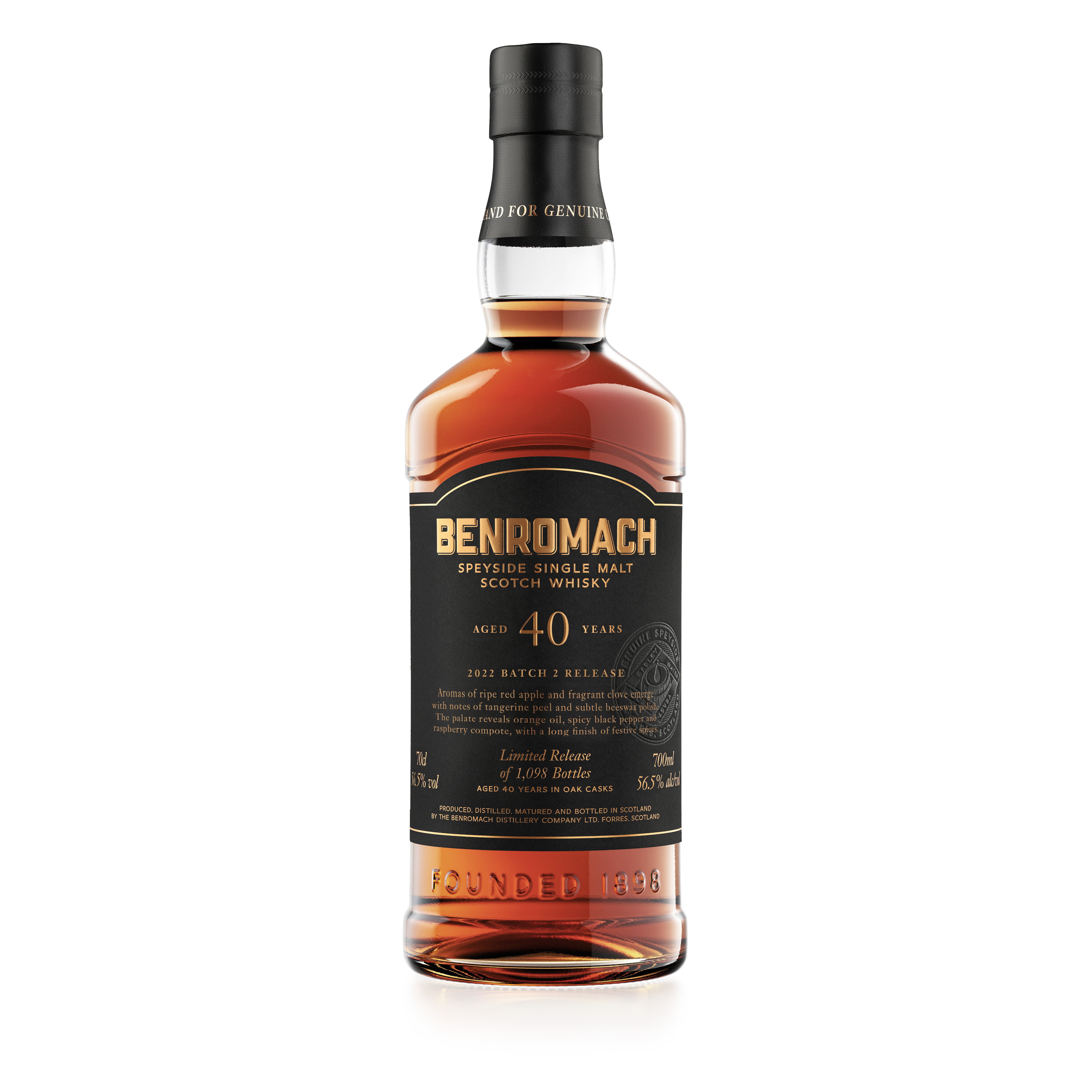 A bottle of Benromach 40 Year Old Speyside Single Malt Scotch Whisky with branding on the label