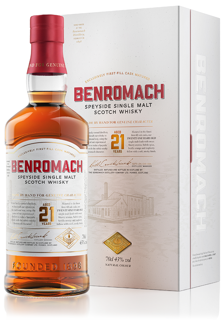 A bottle and box of Benromach 21 Year Old Speyside Single Malt Whisky with branding and age prominent on label