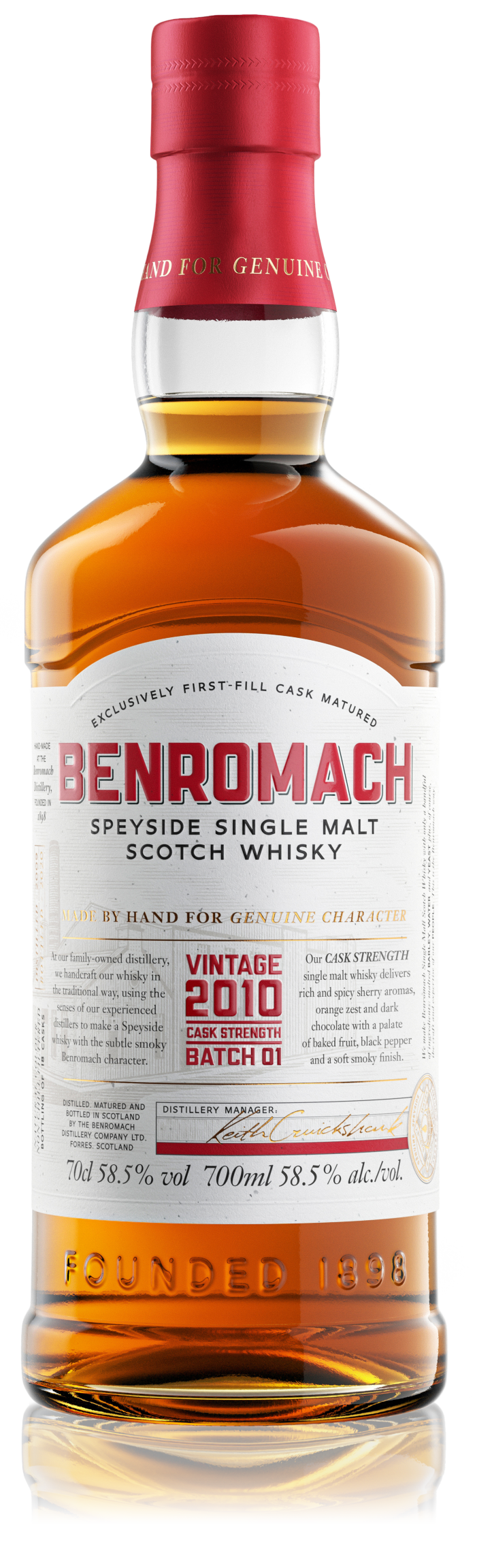 A bottle of Benromach Cask Strength Vintage 2010 Batch 1 with prominent branding on the label