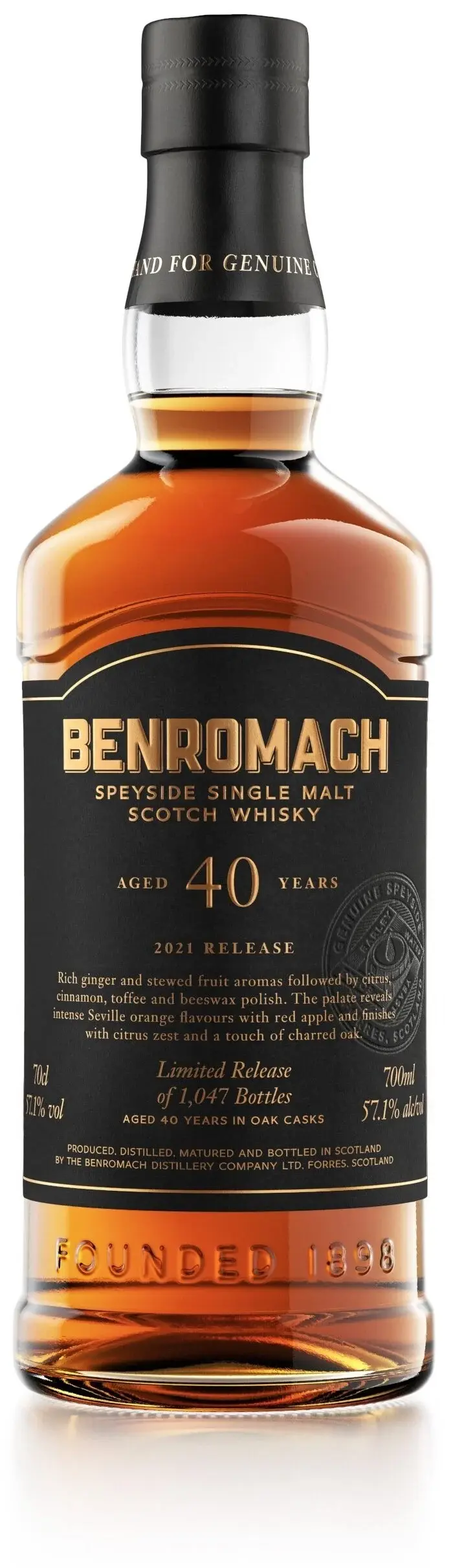 A bottle of Benromach 40 Year Old with prominent branding on the label