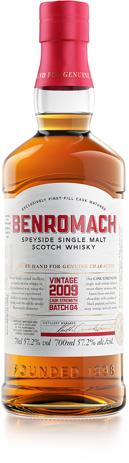 A bottle of Benromach Cask Strength Vintage 2009 Batch 4 with prominent branding on the label