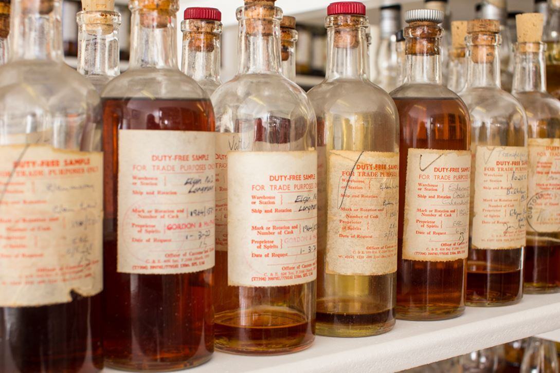 Numerous bottles of whisky in the Gordon and MacPhail sampling room.
