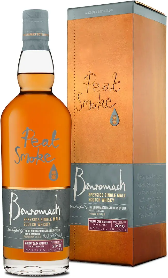 A bottle and box of Benromach Peat Smoke Sherry Cask Matured with old-style branding on the label